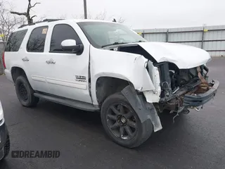2011 GMC Yukon SLT with VIN 1GKS1CE01BR101311, listed as a IAAI auction lot 41572486 with 1 mi miles. Bid and sale history available at carsss.com. Image 1.