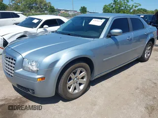 2006 Chrysler 300 Touring with VIN 2C3KA53G56H324954, listed as a IAAI auction lot 42058478 with 124,933 mi miles. Bid and sale history available at carsss.com. Image 17.