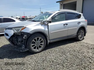 2016 Toyota RAV4 Limited with VIN JTMDJREV6GD018500, listed as a Copart auction lot 56761525 with 142,942 mi miles and Salvage title. Bid and sale history available at DreamBid. Image 1.
