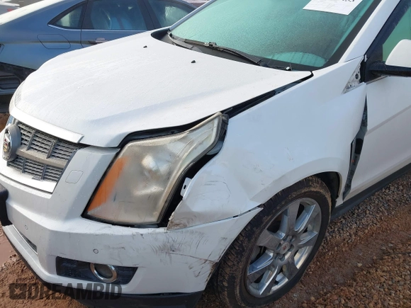 2011 Cadillac SRX Performance Collection with VIN 3GYFNBEY4BS600709, listed as a IAAI auction lot 40858453 with 148,769 mi miles. Bid and sale history available at carsss.com. Image 6.