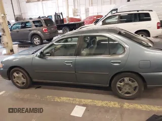 2000 Nissan Altima XE with VIN 1N4DL01D4YC185986, listed as a IAAI auction lot 41831774 with 217,044 mi miles. Bid and sale history available at carsss.com. Image 15.
