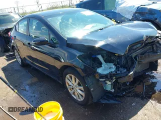 2014 Kia Forte LX with VIN KNAFX4A63E5230865, listed as a IAAI auction lot 41983560 with 103,275 mi miles and . Bid and sale history available at carsss.com. Image 1.