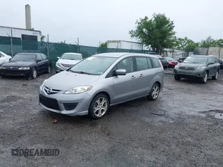 2010 Mazda 5 Sport with VIN JM1CR2WL9A0375192, listed as a IAAI auction lot 42621634 with 130,076 mi miles and . Bid and sale history available at DreamBid. Image 2.