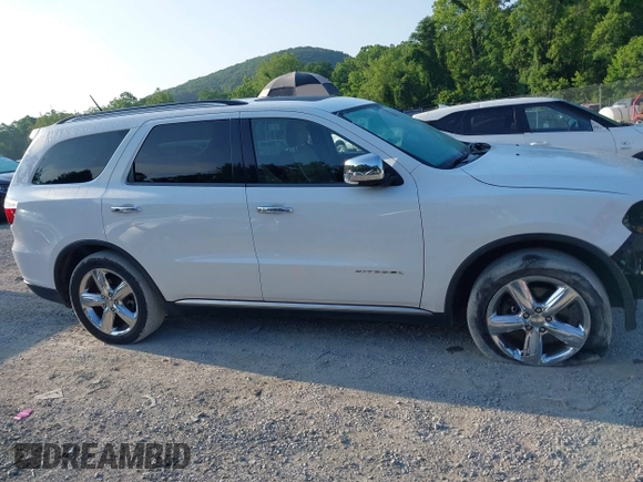 2013 Dodge Durango Citadel with VIN 1C4SDJET6DC652552, listed as a IAAI auction lot 42602746 with 163,602 mi miles and . Bid and sale history available at DreamBid. Image 13.