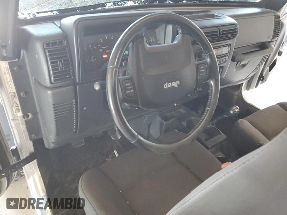 2006 Jeep Wrangler Rubicon with VIN 1J4FA69S26P734731, listed as a Copart auction lot 52009295 with 117,872 mi miles and Salvage title. Bid and sale history available at DreamBid. Image 8.