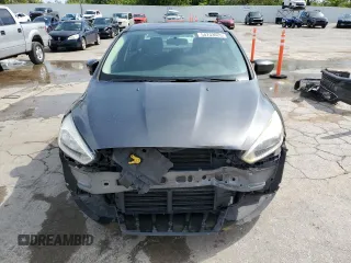 2018 Ford Focus SE z VIN 1FADP3F24JL204488, wystawiony jako Copart lot #54733625 z przebiegiem Nie podano mil oraz Szkoda całkowita • Salvage title. Historia ofert i sprzedaży dostępna na DreamBid. Obrazek 5.