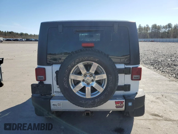 2014 Jeep Wrangler Sahara with VIN 1C4AJWBGXEL125544, listed as a Copart auction lot 51961845 with 146,917 mi miles and Salvage title. Bid and sale history available at DreamBid. Image 6.
