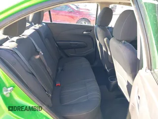 2014 Chevrolet Sonic LT z VIN 1G1JC5SH3E4219619, wystawiony jako IAAI lot #41208791 z przebiegiem 122 161 mil mil oraz . Historia ofert i sprzedaży dostępna na DreamBid. Obrazek 8.