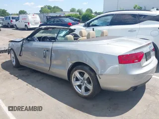 2014 Audi A5 Premium Plus z VIN WAULFAFH6EN003233, wystawiony jako IAAI lot #42178794 z przebiegiem 59 860 mil mil oraz . Historia ofert i sprzedaży dostępna na DreamBid. Obrazek 3.