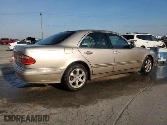 2002 Mercedes-Benz E-Class with VIN WDBJF65J22B490275, listed as a Copart auction lot 51128565 with 142,232 mi miles and Salvage Title. Bid and sale history available at carsss.com. Image 3.