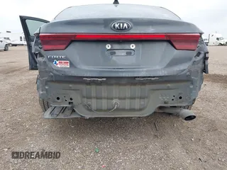 2021 Kia Forte LXS with VIN 3KPF24AD9ME358627, listed as a IAAI auction lot 42106430 with 56,589 mi miles and . Bid and sale history available at DreamBid. Image 6.