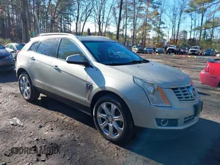 2015 Cadillac SRX Performance Collection z VIN 3GYFNCE38FS538537, wystawiony jako IAAI lot #40982982 z przebiegiem 116 632 mil mil oraz . Historia ofert i sprzedaży dostępna na DreamBid. Obrazek 1.