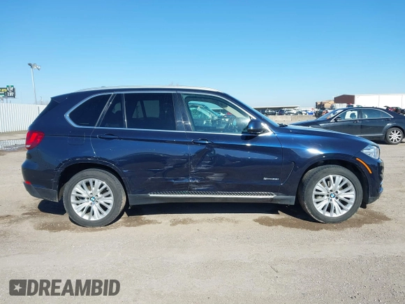 2016 BMW X5 sDrive35i with VIN 5UXKR2C55G0R71330, listed as a IAAI auction lot 41661140 with 128,457 mi miles. Bid and sale history available at carsss.com. Image 13.