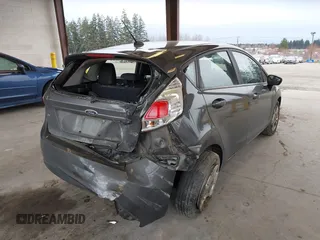 2016 Ford Fiesta SE with VIN 3FADP4EJ0GM150290, listed as a IAAI auction lot 41802899 with 126,778 mi miles. Bid and sale history available at carsss.com. Image 4.