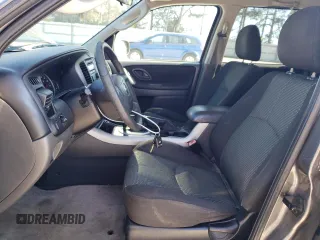 2006 Mazda Tribute S with VIN 4F2YZ04176KM19634, listed as a Copart auction lot 46796315 with 276,632 mi miles and Salvage Title. Bid and sale history available at DreamBid. Image 7.