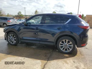 2021 Mazda CX-5 Grand Touring with VIN JM3KFBDM8M0489180, listed as a Copart auction lot 49900525 with 34,687 mi miles and Salvage Title. Bid and sale history available at carsss.com. Image 2.