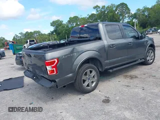 2019 Ford F-150 XL with VIN 1FTEW1CP6KFA29974, listed as a IAAI auction lot 42700306 with 114,333 mi miles and . Bid and sale history available at DreamBid. Image 4.