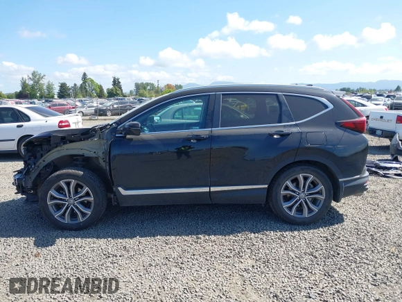 2021 Honda CR-V Touring with VIN 2HKRW2H96MH681908, listed as a IAAI auction lot 42082535 with 65,570 mi miles and . Bid and sale history available at DreamBid. Image 15.