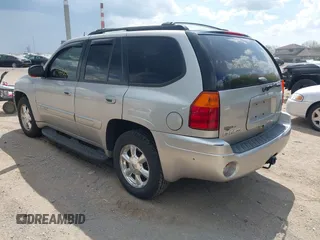 2005 GMC Envoy SLE z VIN 1GKDT13S852271545, wystawiony jako IAAI lot #42117632 z przebiegiem 213 355 mil mil oraz . Historia ofert i sprzedaży dostępna na DreamBid. Obrazek 3.