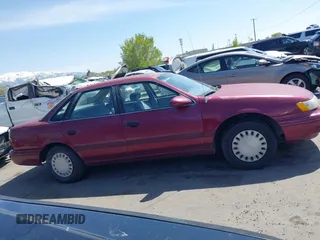 1993 Ford Taurus z VIN 1FACP52U4PG225521, wystawiony jako IAAI lot #42096535 z przebiegiem 76 808 mil mil oraz . Historia ofert i sprzedaży dostępna na DreamBid. Obrazek 13.