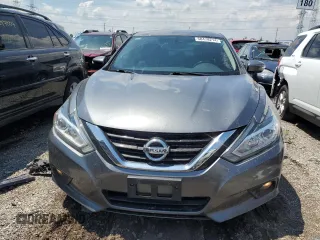 2016 Nissan Altima SL with VIN 1N4AL3AP9GC163155, listed as a Copart auction lot 58478214 with 63,105 mi miles and Salvage title. Bid and sale history available at DreamBid. Image 5.