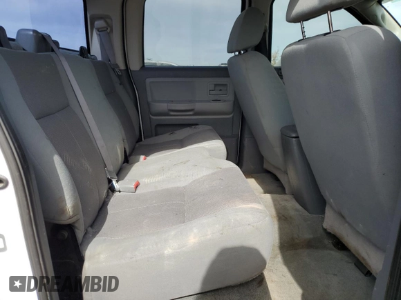 2005 Dodge Dakota SLT with VIN 1D7HE48N35S263600, listed as a Copart auction lot 46705555 with 128,519 mi miles and Salvage Title. Bid and sale history available at DreamBid. Image 10.