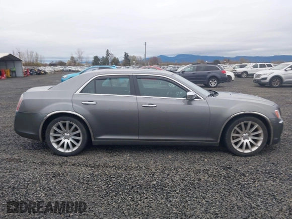 2011 Chrysler 300 with VIN 2C3CA6CT8BH547555, listed as a IAAI auction lot 41858626 with 141,853 mi miles. Bid and sale history available at carsss.com. Image 13.