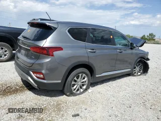 2019 Hyundai Santa Fe SE with VIN 5NMS2CAD9KH010261, listed as a Copart auction lot 59548605 with 139,268 mi miles and Salvage title. Bid and sale history available at DreamBid. Image 3.