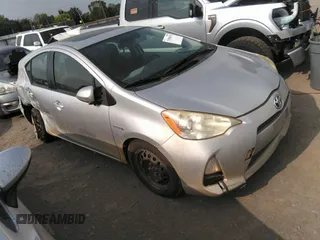 2012 Toyota Prius c One with VIN JTDKDTB34C1001074, listed as a IAAI auction lot 37090678 with Not Provided miles. Bid and sale history available at carsss.com. Image 1.