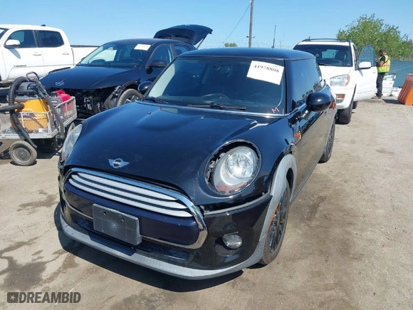 2015 MINI Cooper Hardtop with VIN WMWXM5C51FT941078, listed as a IAAI auction lot 41978808 with 62,682 mi miles. Bid and sale history available at carsss.com. Image 2.