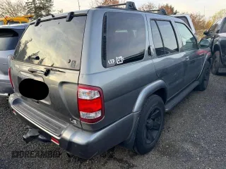 2004 Nissan Pathfinder SE with VIN JN8DR09Y64W905091, listed as a Copart auction lot 57692615 with 238,457 mi miles and Clean title. Bid and sale history available at DreamBid. Image 4.