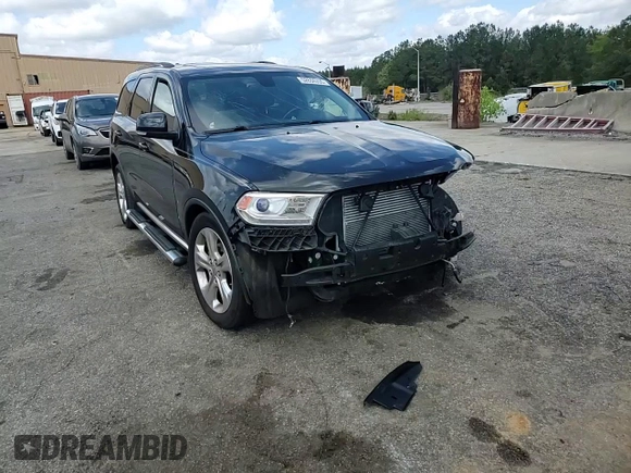 2014 Dodge Durango Limited z VIN 1C4RDHDG5EC313892, wystawiony jako Copart lot #52634355 z przebiegiem 167 053 mil mil oraz Szkoda całkowita • Salvage title. Historia ofert i sprzedaży dostępna na DreamBid. Obrazek 11.