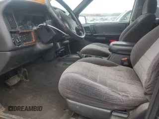 1998 Jeep Grand Cherokee Laredo with VIN 1J4GZ58S2WC281923, listed as a Copart auction lot 44010885 with 210,959 mi miles and Salvage Title. Bid and sale history available at carsss.com. Image 7.