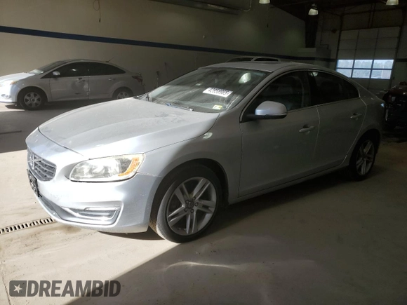 2014 Volvo S60 T5 with VIN YV1612FS7E2293736, listed as a Copart auction lot 42958965 with 127,657 mi miles and Salvage Title. Bid and sale history available at carsss.com. Image 1.