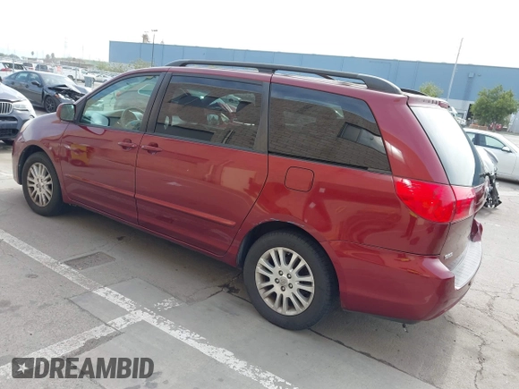 2009 Toyota Sienna XLE with VIN 5TDZK22C29S261516, listed as a IAAI auction lot 41831006 with 147,667 mi miles. Bid and sale history available at carsss.com. Image 3.