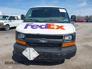 2014 Chevrolet Express Cargo Van with VIN 1GCWGFCA0E1205946, listed as a IAAI auction lot 41685687 with 317,212 mi miles. Bid and sale history available at carsss.com. Image 6.