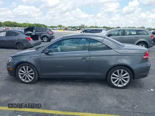 2014 Volkswagen Eos Sport with VIN WVWBW8AH2EV000313, listed as a IAAI auction lot 42333112 with 106,125 mi miles and . Bid and sale history available at DreamBid. Image 14.