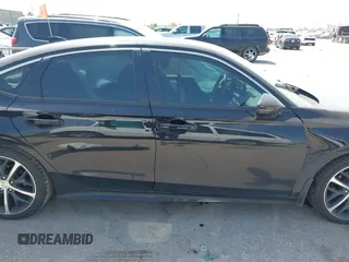 2024 Honda Civic Touring z VIN 2HGFE1F9XRH326146, wystawiony jako IAAI lot #41835336 z przebiegiem 8 469 mil mil oraz . Historia ofert i sprzedaży dostępna na DreamBid. Obrazek 13.
