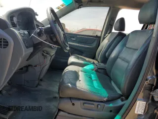 2003 Honda Odyssey EX-L z VIN 5FNRL189X3B088813, wystawiony jako Copart lot #56221685 z przebiegiem 204 443 mil mil oraz Szkoda całkowita • Salvage title. Historia ofert i sprzedaży dostępna na DreamBid. Obrazek 7.