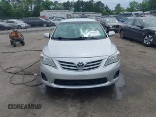 2013 Toyota Corolla L with VIN 5YFBU4EE0DP172081, listed as a IAAI auction lot 42115933 with 144,319 mi miles and . Bid and sale history available at DreamBid. Image 12.
