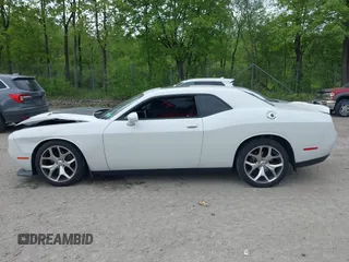 2015 Dodge Challenger SXT Plus z VIN 2C3CDZBG9FH705579, wystawiony jako IAAI lot #42268112 z przebiegiem 83 786 mil mil oraz . Historia ofert i sprzedaży dostępna na DreamBid. Obrazek 14.