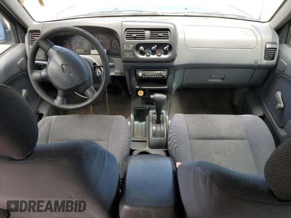 2001 Nissan Frontier SE with VIN 1N6ED27T91C390230, listed as a Copart auction lot 58844905 with 157,883 mi miles and Salvage title. Bid and sale history available at DreamBid. Image 8.