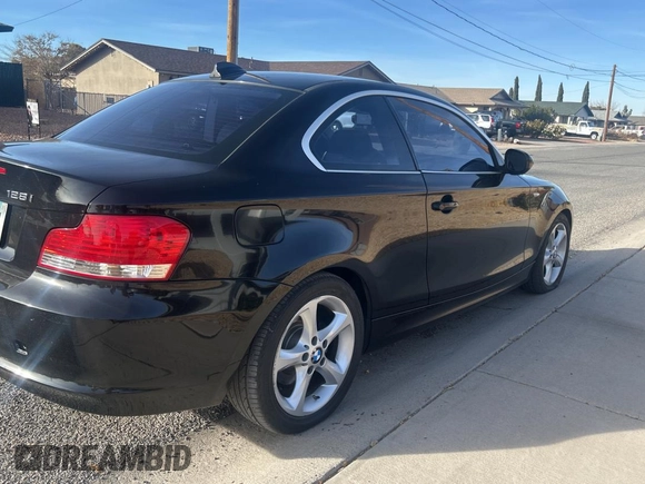 2010 BMW 1 Series 128i with VIN WBAUP9C58AVF49460, listed as a Copart auction lot 85806914 with 252,819 mi miles and Clean Title. Bid and sale history available at DreamBid. Image 4.