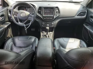 2019 Jeep Cherokee High Altitude with VIN 1C4PJMDX2KD283992, listed as a Copart auction lot 59849195 with 103,463 mi miles and Salvage title. Bid and sale history available at DreamBid. Image 8.