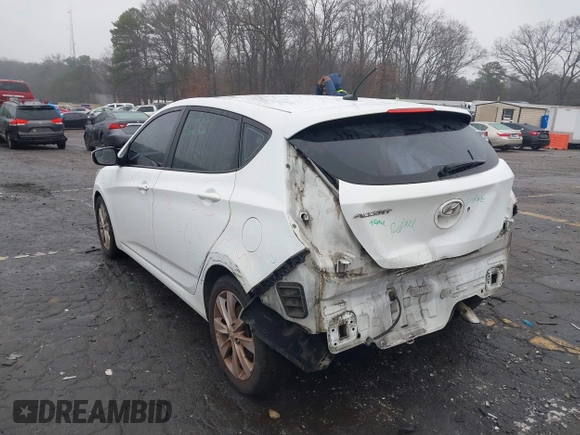2014 Hyundai Accent SE with VIN KMHCU5AE8EU145629, listed as a IAAI auction lot 41497848 with 134,919 mi miles. Bid and sale history available at carsss.com. Image 3.