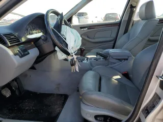 2000 BMW 3 Series 323i with VIN WBAAM3343YKC68050, listed as a Copart auction lot 46051345 with 137,890 mi miles and Salvage title. Bid and sale history available at DreamBid. Image 7.