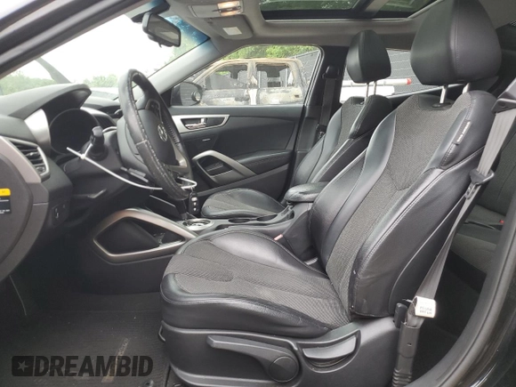 2012 Hyundai Veloster w/Black Int with VIN KMHTC6AD5CU065525, listed as a Copart auction lot 56415785 with 100,151 mi miles and Salvage title. Bid and sale history available at DreamBid. Image 7.