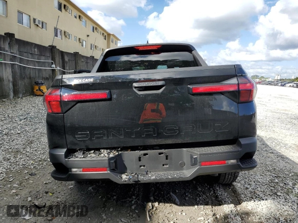 2023 Hyundai Santa Cruz SEL z VIN 5NTJB4AE4PH057705, wystawiony jako Copart lot #80667054 z przebiegiem 14 580 mil mil oraz Nie do naprawy • Non repairable. Historia ofert i sprzedaży dostępna na DreamBid. Obrazek 6.