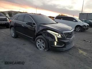2021 Cadillac XT5 FWD Luxury with VIN 1GYKNAR45MZ109538, listed as a Copart auction lot 82933514 with 34,654 mi miles and Salvage Title. Bid and sale history available at carsss.com. Image 4.