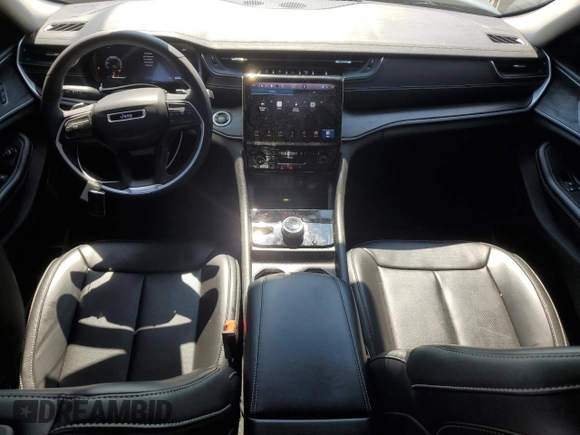2023 Jeep Grand Cherokee Limited with VIN 1C4RJHBGXPC642795, listed as a Copart auction lot 57123245 with 51,399 mi miles and Salvage title. Bid and sale history available at DreamBid. Image 8.